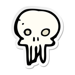 sticker of a cartoon spooky skull symbol