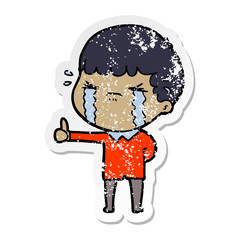 distressed sticker of a cartoon man crying