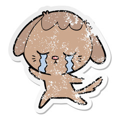 distressed sticker of a cartoon crying dog