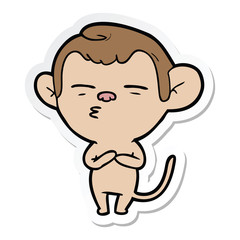sticker of a cartoon suspicious monkey