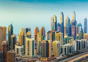 Fototapeta na wymiar Amazing rooftop view on Dubai Marina skyscrapers and Sheikh Zayed road, Dubai, United Arab Emirates