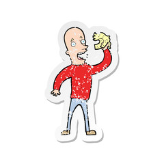 retro distressed sticker of a cartoon bald man with wig