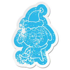 cartoon distressed sticker of a bored dog wearing santa hat