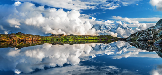 Summer panorama of the Lac Blanc lake with Mont Blanc (Monte Bianco) on background, Chamonix location. Beautiful outdoor scene in Vallon de Berard Nature Reserve, Graian Alps, France, Europe.