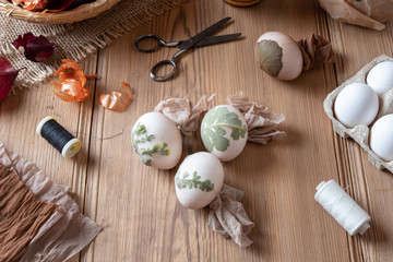 Preparation of Easter eggs for dying with onion peels