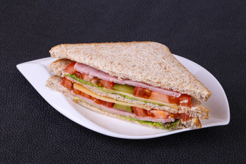 Club sandwich with ham and cheese