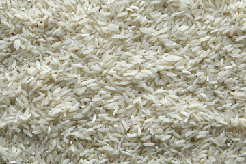 background of rice. Rice texture. Rice grains closeup. Top view