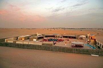 Sunset Bedouin camp after the traditional desert safaris in Dubai, United Arab Emirates