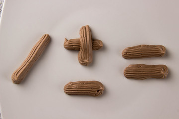 Math signs written by chocolate cream