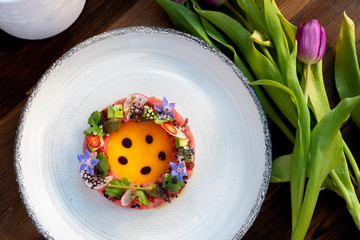 Tuna Tartar with Avocado on white plate, molecular Haute cuisine