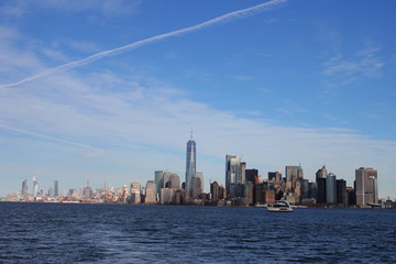 Wide Cityscape of manhattan as seen from liberty island