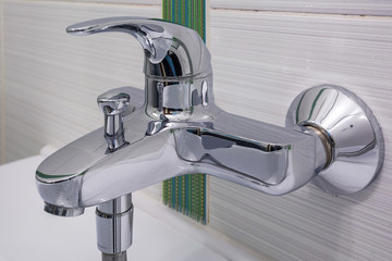 Water tap sink with faucet in expensive loft bathroom