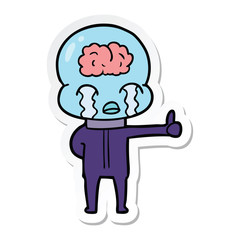 sticker of a cartoon big brain alien crying but giving thumbs up symbol