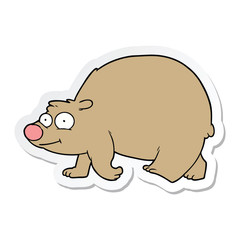 sticker of a cartoon walking bear
