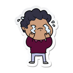 sticker of a cartoon man crying
