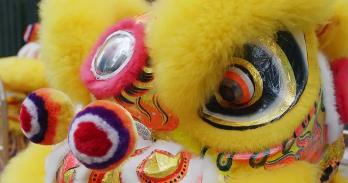 Chinese lion dance in yellow