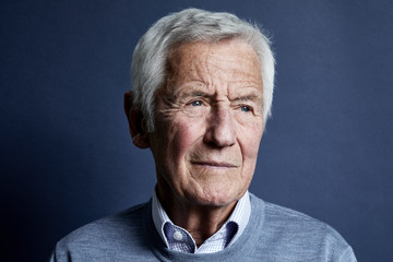 Portrait of pensive senior man