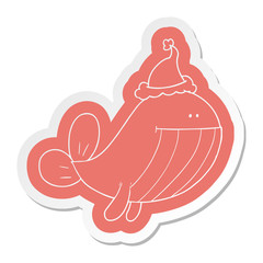 cartoon  sticker of a whale wearing santa hat