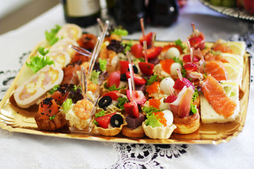 Tasty dessert with fruit and meat on the banquet