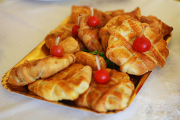 Tasty dessert with dough on the banquet