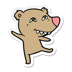 sticker of a cartoon bear dancing