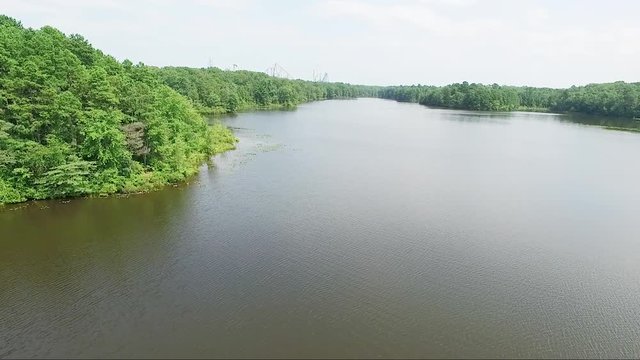 Wide aerial, view of Great Adventure from nearby lake in New Jersey