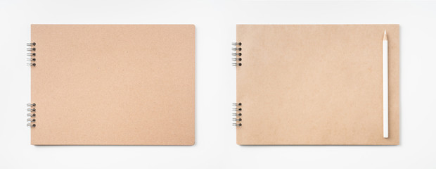 kraft notebook and pen on white background