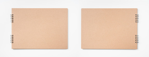 kraft notebook and pen on white background