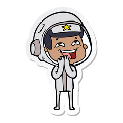 sticker of a cartoon laughing astronaut