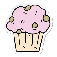 sticker of a quirky hand drawn cartoon muffin cake