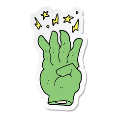 sticker of a cartoon spooky magic hand