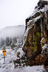 Left Turn by a Snow-Capped Boulder