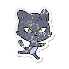 distressed sticker of a cute cartoon cat