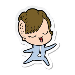 sticker of a happy cartoon girl in onesie