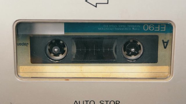 Tape Recorder Plays Audio Cassette inserted therein. Vintage Audio Tape