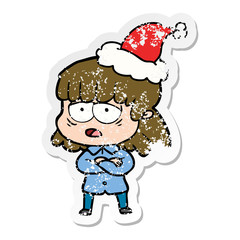 distressed sticker cartoon of a tired woman wearing santa hat