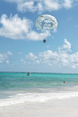 parasailing on beach - 253879689