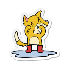 sticker of a laughing fox in a puddle