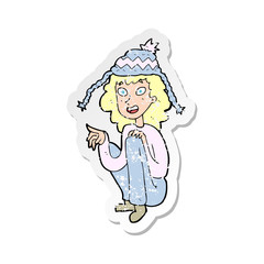 retro distressed sticker of a cartoon woman wearing winter hat