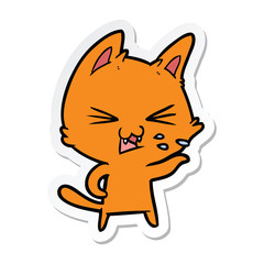 sticker of a cartoon cat hissing
