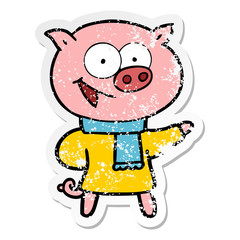 distressed sticker of a cheerful pig wearing winter clothes cartoon