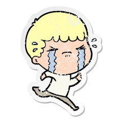 distressed sticker of a cartoon man crying