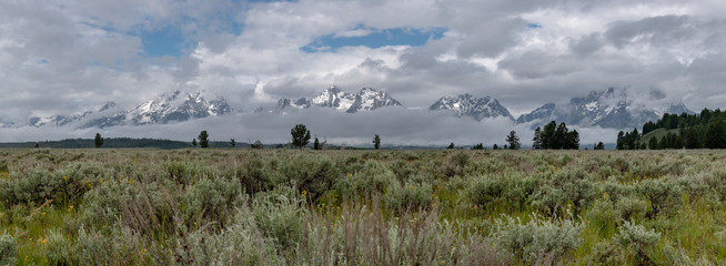 Panorama of Thick Clouds at Base of Teton Range
