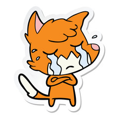 sticker of a crying fox cartoon