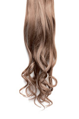 Fototapeta premium Long wavy brown hair on white background