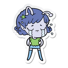 sticker of a cartoon crying alien girl