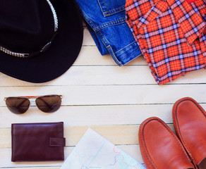 Men's casual outfits with man clothing, travel preparations and accessories