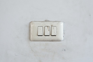 switch on dirty white wall, turn off