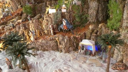 Representation with figures of the town of Belen with the virgin Mary fleeing through the desert