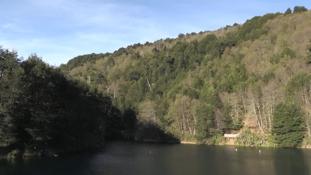 Tilt down of small lake in south of chie